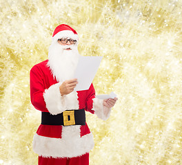 Image showing man in costume of santa claus with letter