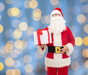 Image showing man in costume of santa claus with gift box