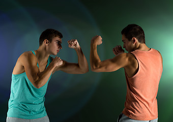 Image showing young men fighting hand-to-hand