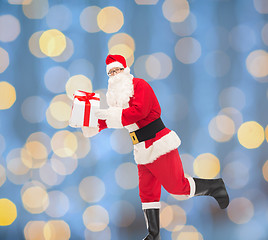 Image showing man in costume of santa claus with gift box