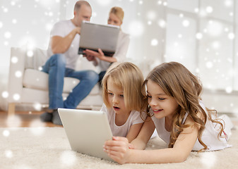 Image showing happy family with tablet pc computers