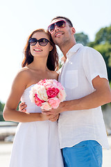 Image showing smiling couple in city