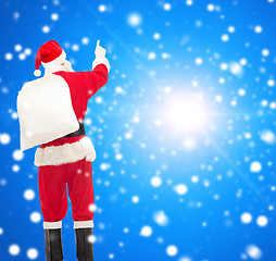 Image showing man in costume of santa claus with bag