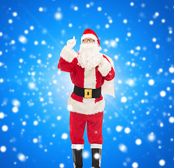 Image showing man in costume of santa claus with bag