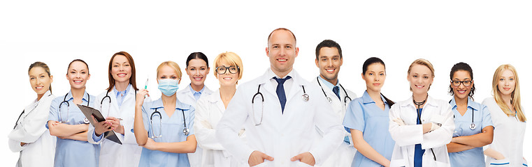 Image showing group of smiling doctors with clipboard