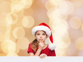 Image showing smiling little girl in santa helper hat