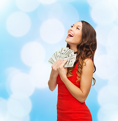 Image showing woman in red dress with us dollar money