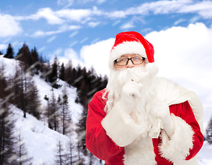 Image showing man in costume of santa claus with bag