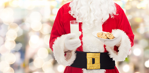 Image showing santa claus with glass of milk and cookies