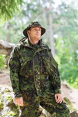 Image showing young soldier or ranger in forest