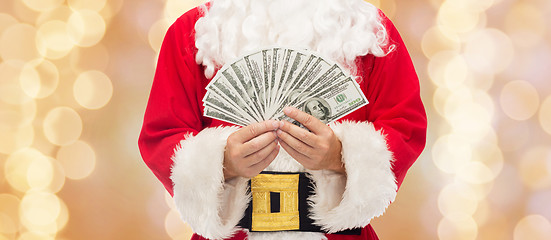 Image showing close up of santa claus with dollar money