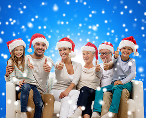 Image showing happy family sitting on couch