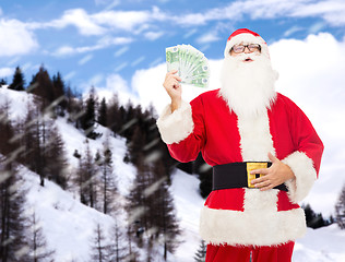 Image showing man in costume of santa claus with euro money