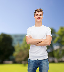 Image showing smiling young man in blank white t-shirt