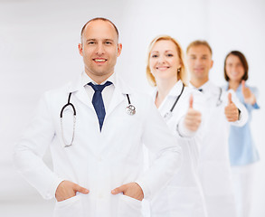 Image showing smiling male doctor with stethoscope