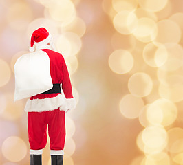 Image showing man in costume of santa claus with bag