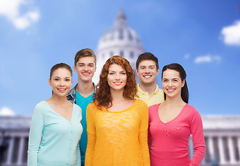 Image showing group of smiling teenagers showing ok sign