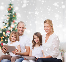 Image showing happy family with tablet pc computers at home