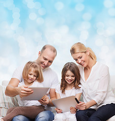 Image showing happy family with tablet pc computers