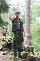 Image showing young soldier or ranger in forest