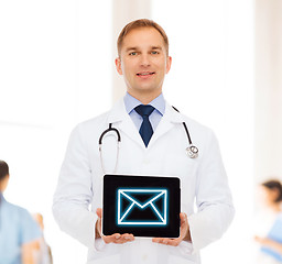 Image showing smiling male doctor with stethoscope and tablet pc