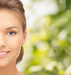 Image showing beautiful young woman half face