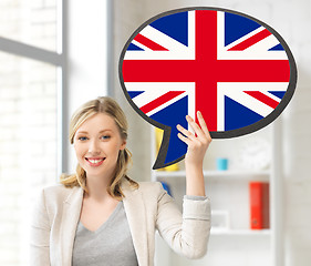 Image showing smiling woman with text bubble of british flag