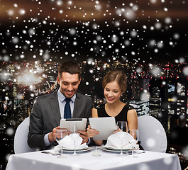 Image showing smiling couple at restaurant