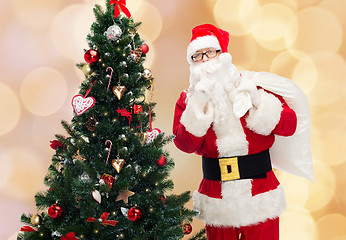 Image showing santa claus with bag and christmas tree