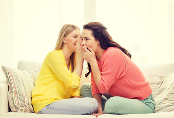 Image showing one girl telling another secret