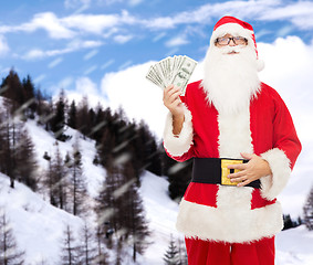 Image showing man in costume of santa claus with dollar money