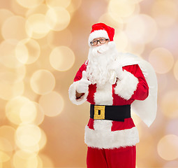 Image showing man in costume of santa claus with bag