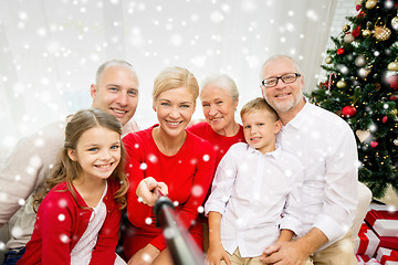 Image showing smiling family making selfie at home