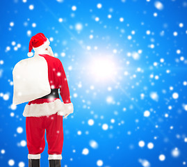 Image showing man in costume of santa claus with bag