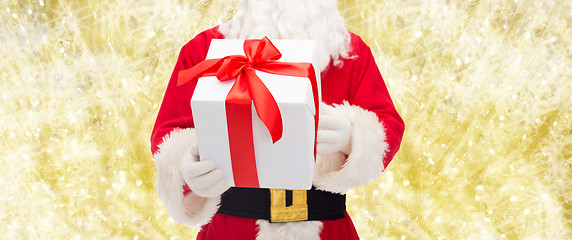 Image showing man in costume of santa claus with gift box