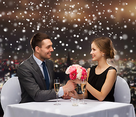 Image showing smiling couple at restaurant