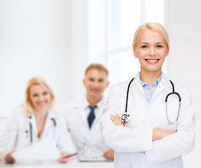 Image showing smiling female doctor with stethoscope