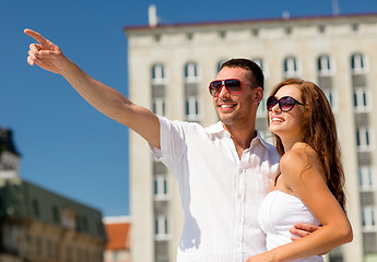 Image showing smiling couple in city