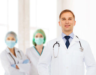 Image showing smiling male doctor with stethoscope