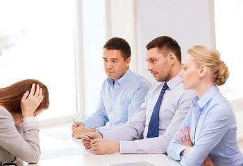 Image showing businesswoman getting fired in office