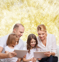 Image showing happy family with tablet pc computers