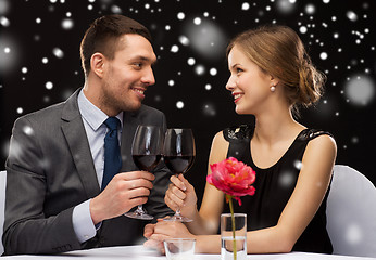 Image showing smiling couple at restaurant