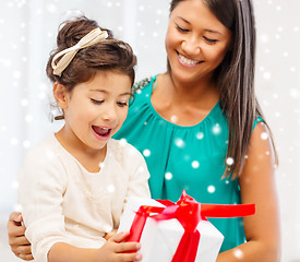 Image showing happy mother and child girl with gift box