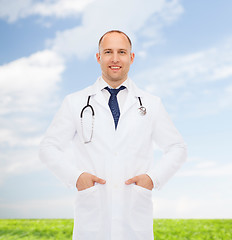 Image showing smiling male doctor with stethoscope