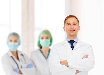 Image showing smiling male doctor in white coat