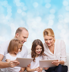 Image showing happy family with tablet pc computers