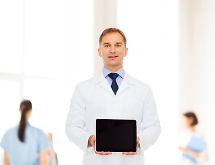 Image showing smiling male doctor with tablet pc