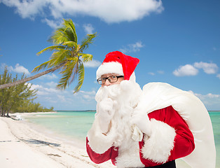 Image showing man in costume of santa claus with bag