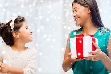 Image showing happy mother and child girl with gift box