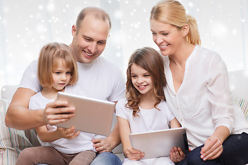 Image showing happy family with tablet pc computers